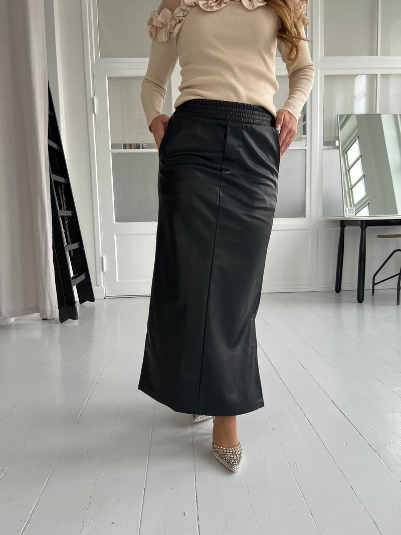 Its may black skirt