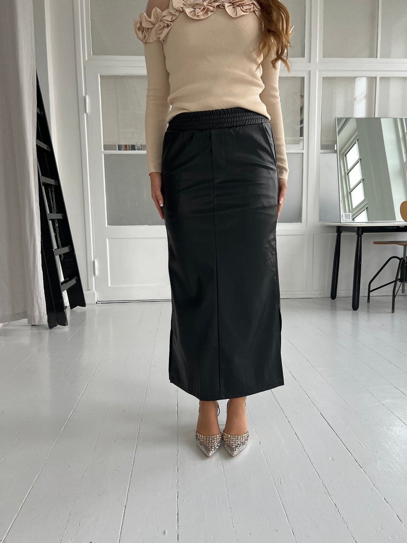 Its may black skirt