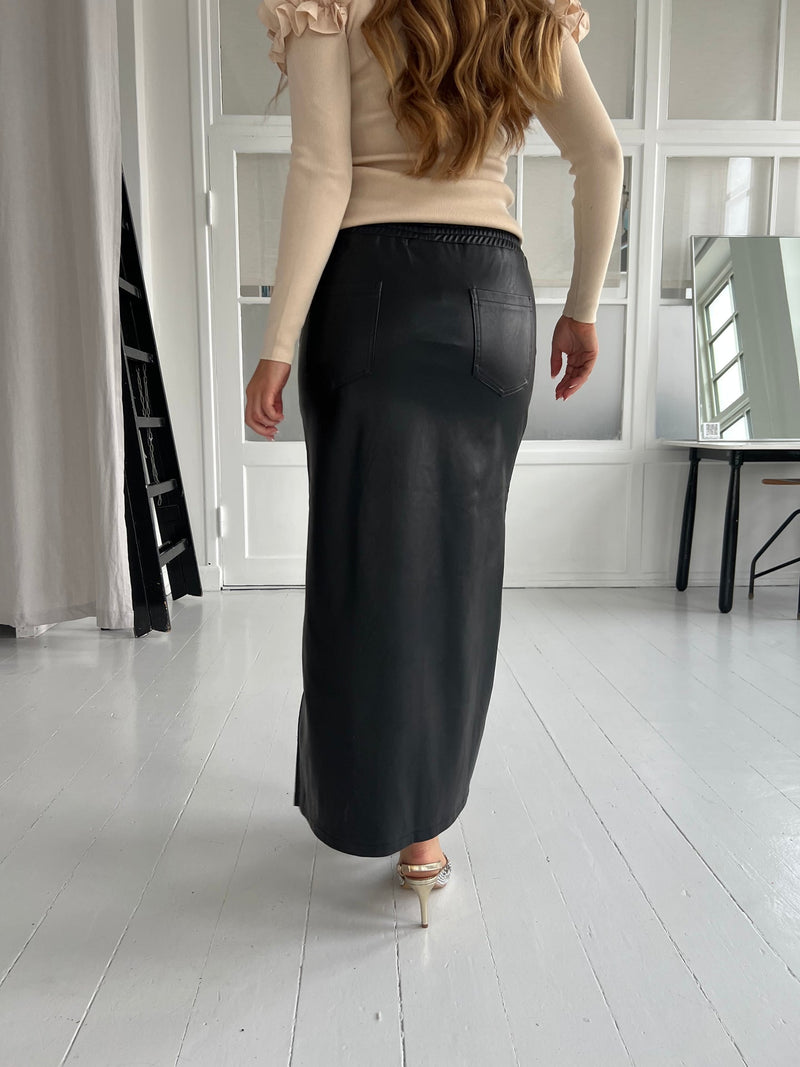 Its may black skirt